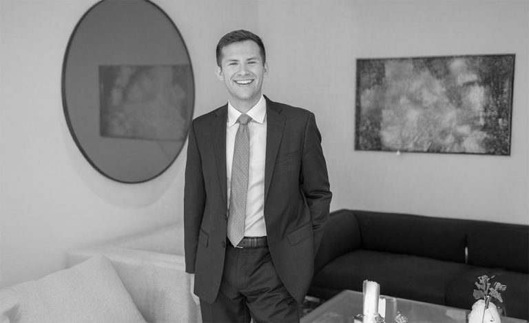 LEXBRIDGE LC, a leading expert in crypto compliance, standing in a professional office setting, offering legal guidance on blockchain regulations.
